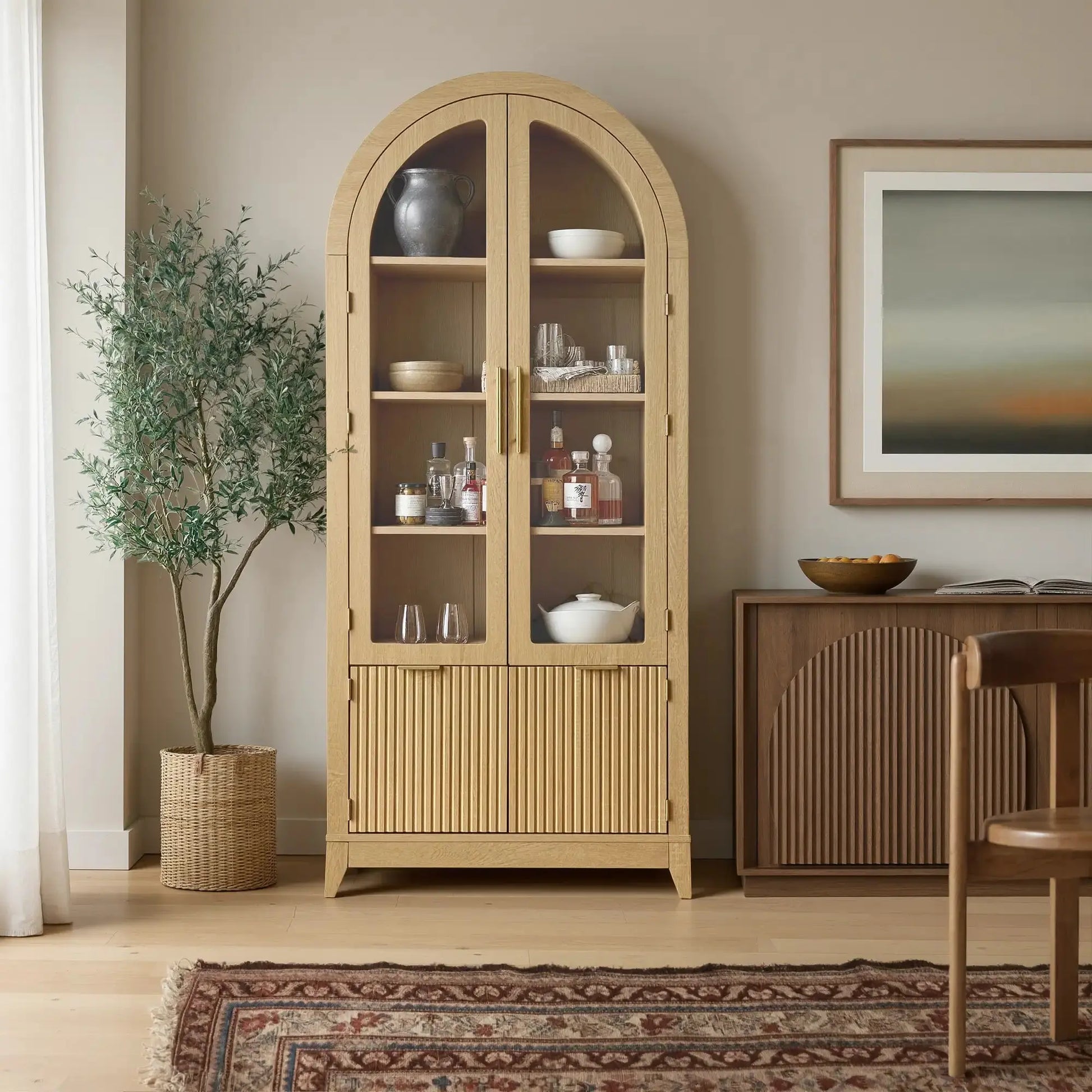 Win2Win Tall Arched Cabinet with Glass Doors, Oak Storage Cabinet with Fluted Doors in a dining room, holding tableware and spirits